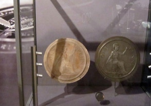 Royal mint visitors centre museum objects mounts for coin templates