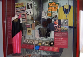 Museum of Liverpool dress trumpet violin arcordian record object mounts